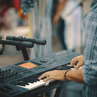 man playing keyboard